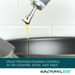 Oil being poured into a pan from a spout.