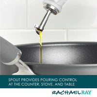 Pouring oil into a black frying pan with a metal handle.