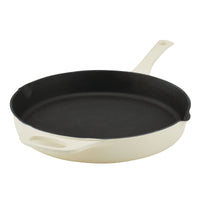 White and black cast iron skillet with a handle on a plain white background.