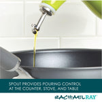 Oil pouring from a green spout into a black pan.