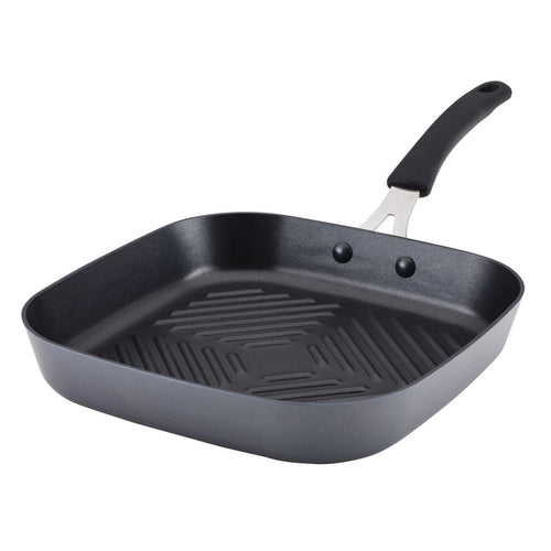 11-Inch Cook + Create Hard Anodized Nonstick Deep Grill Pan, crafted from durable hard-anodized aluminum, includes a scratch-resistant surface and boasts a sleek black handle.