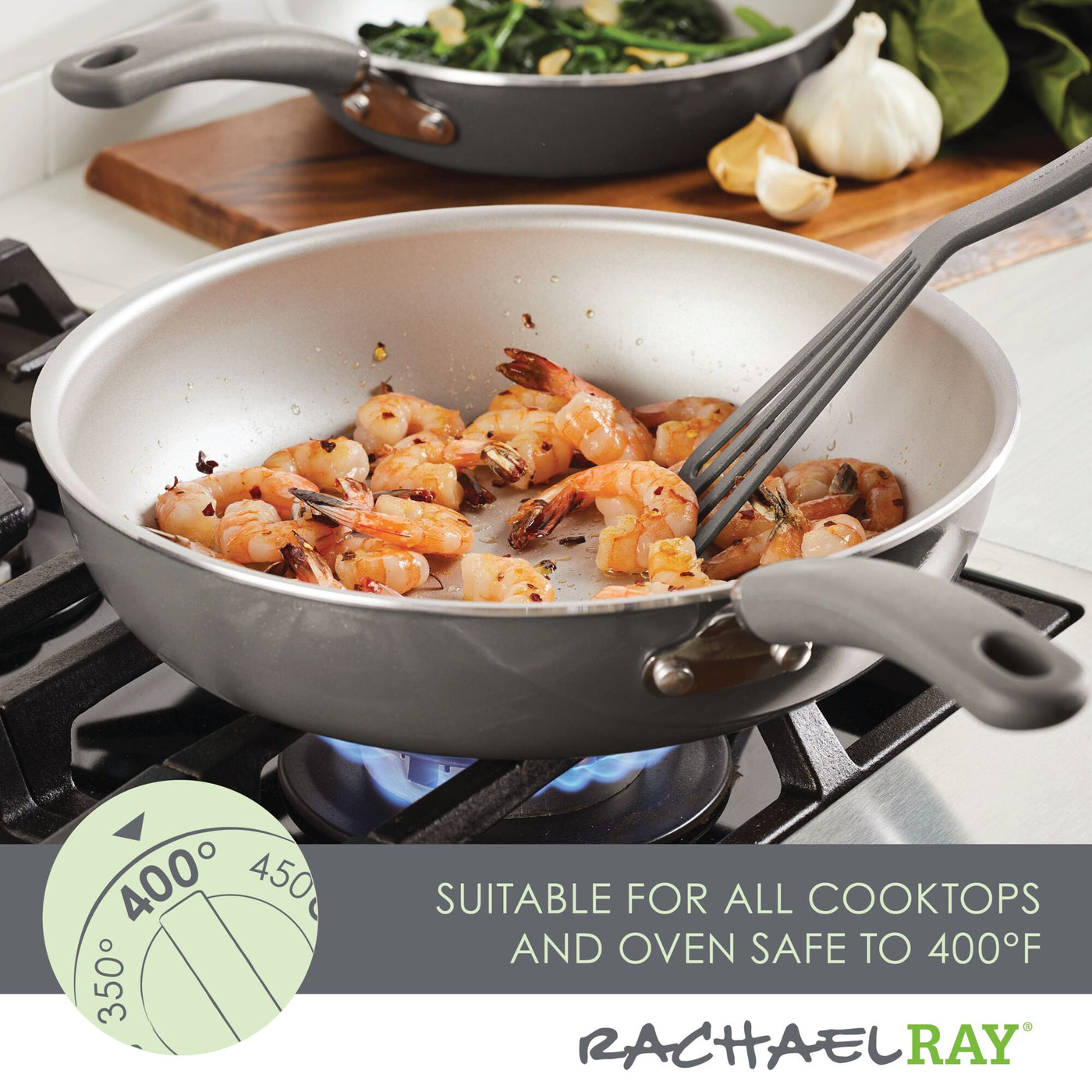 Shrimp being sautéed in a nonstick pan on a stovetop.