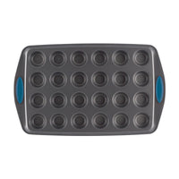 Mini muffin pan with 24 cups and blue silicone grips.