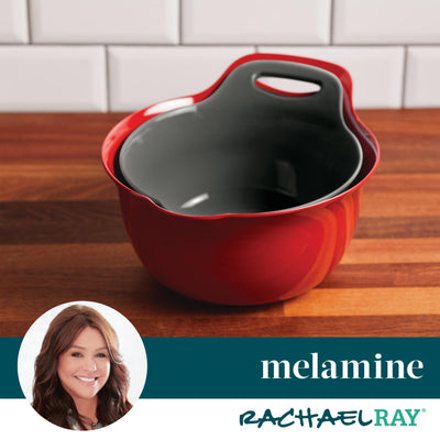 Red mixing bowl on a wooden countertop, with a brand logo at the bottom.