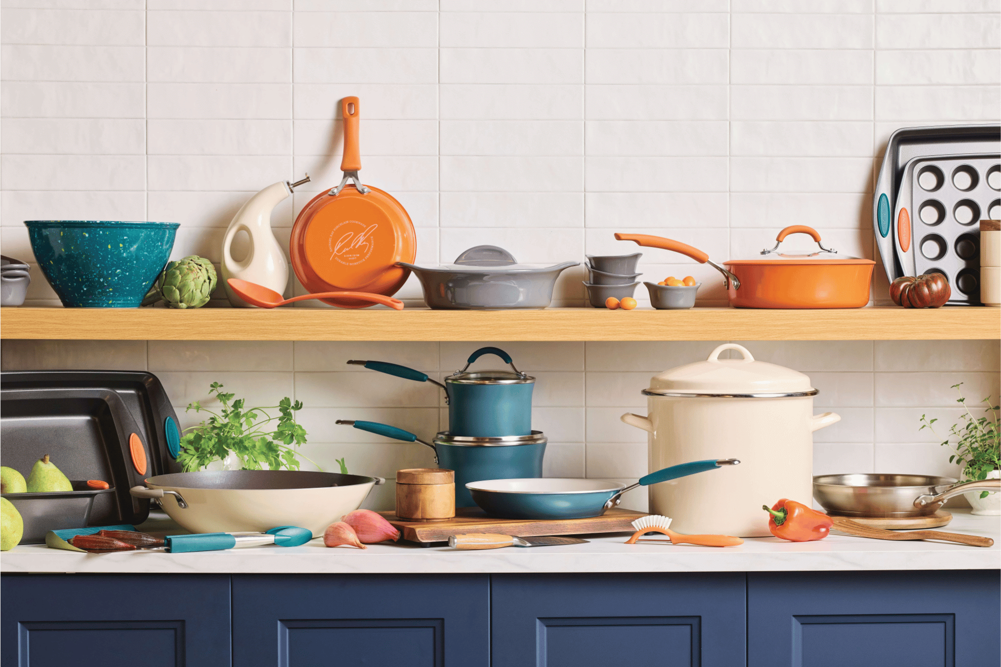 A kitchen shelf with assorted cookware and utensils.