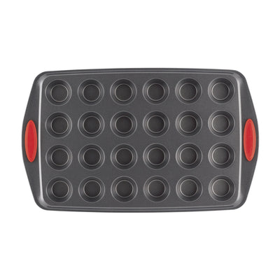 Non-stick 24-cup mini muffin pan with red silicone handles.