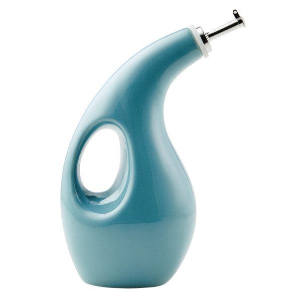 The EVOO Bottle 24-Ounce is a blue ceramic container with a curved shape and side handle, complete with a stainless steel pour spout for precision pouring.