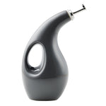 A sleek, modern olive oil dispenser with a curved handle and spout.