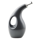 A sleek, modern olive oil dispenser with a curved handle and spout.