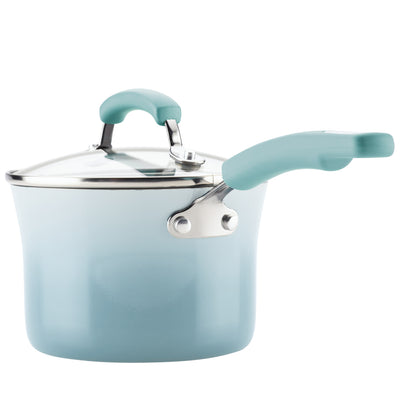 Blue saucepan with a lid and teal handles.