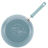 Light blue nonstick frying pan with a long handle and branding text.