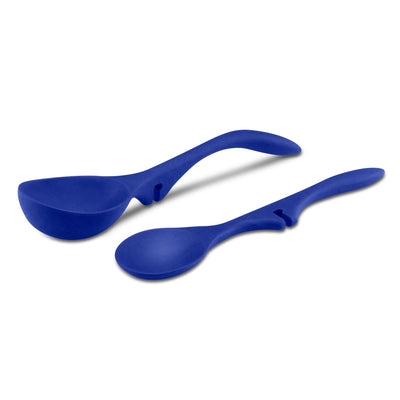 Two blue silicone kitchen spoons against a white background.