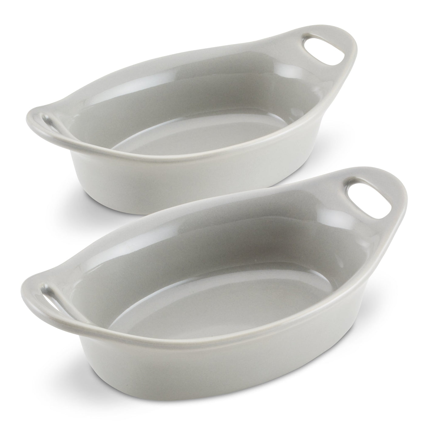 Two empty gray oval ceramic baking dishes with handles.