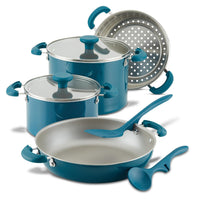 Seven-piece teal cookware set with pots, pans, lids, and utensils.