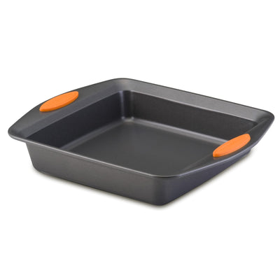 Square baking pan with orange handles on each side.