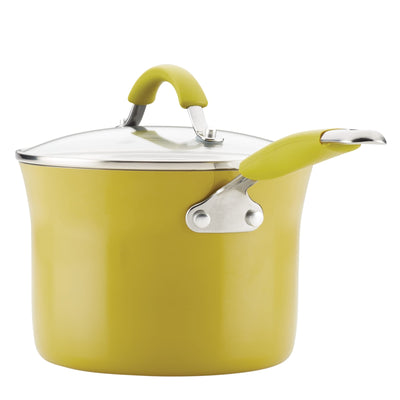 Yellow pot with lid and handles on a white background.