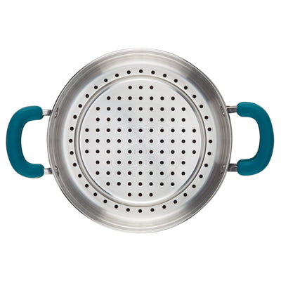 Top view of a metal colander with teal handles and perforated bottom.