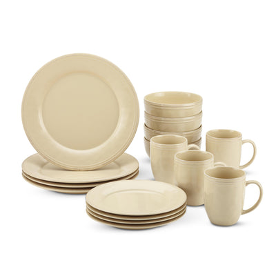 Set of beige dinnerware including plates, bowls, and mugs.