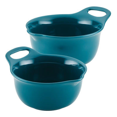 Two teal mixing bowls with handles stacked together.