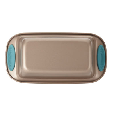 Rectangular baking tray with blue silicone grips on each end.