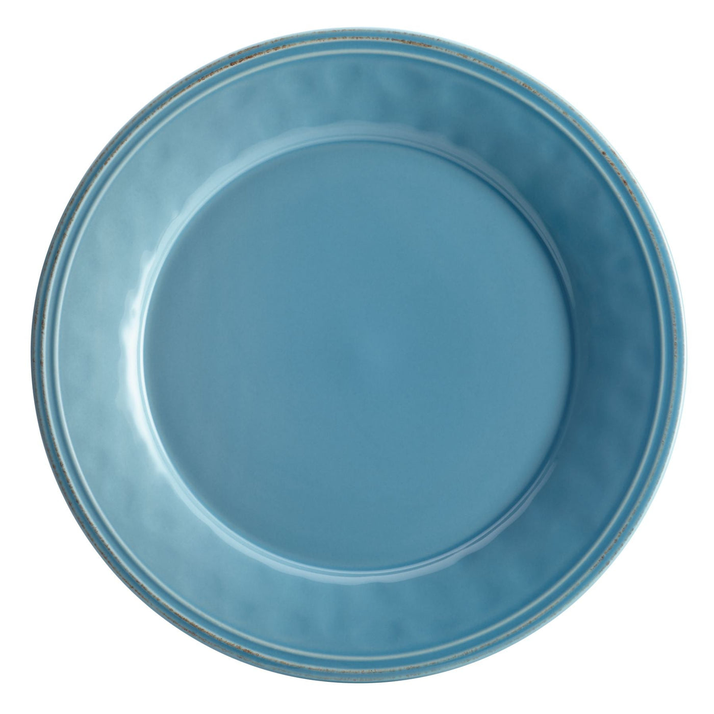 A blue ceramic plate against a white background.
