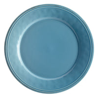 A blue ceramic plate against a white background.