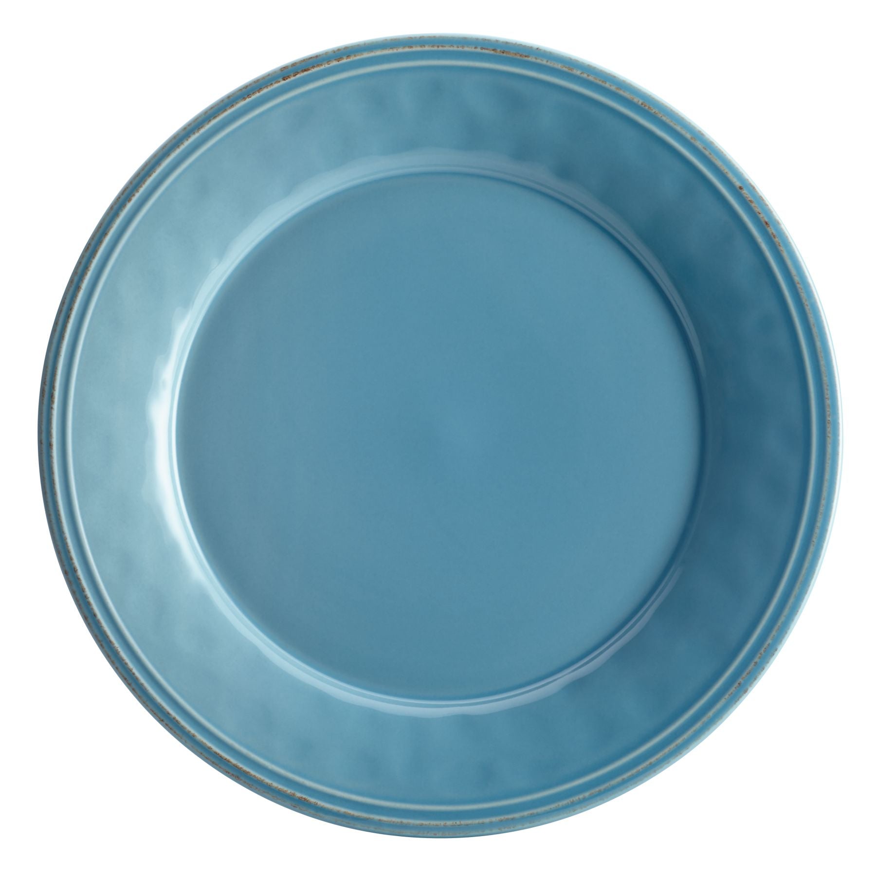 A blue ceramic plate against a white background.