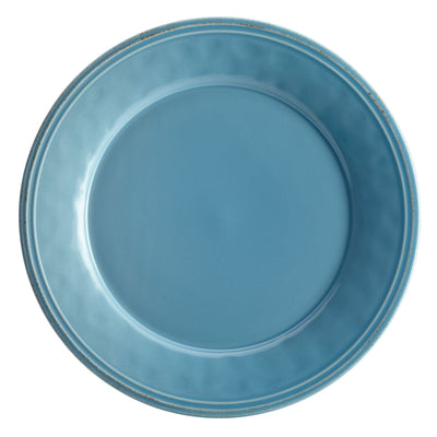 A blue ceramic plate against a white background.