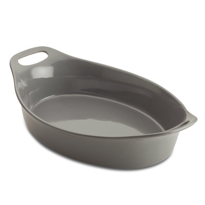 Gray ceramic baking dish with an oval shape and two handles.