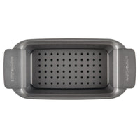 Non-stick perforated loaf pan shown from above.