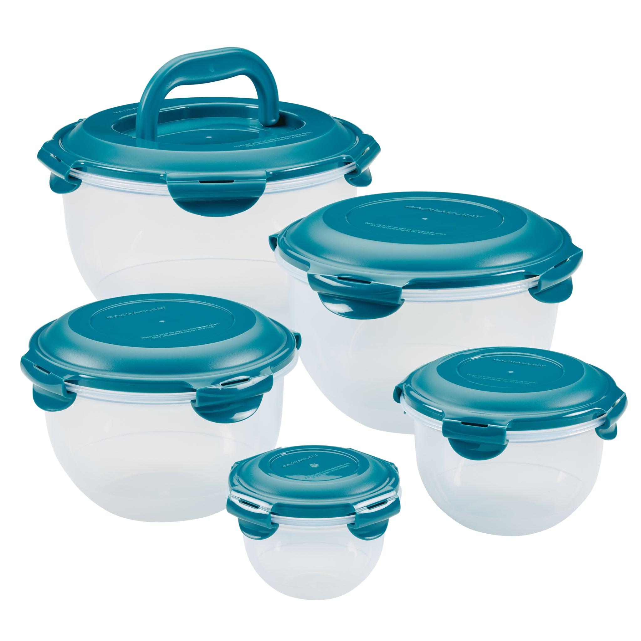 Five clear food storage containers with teal lids.