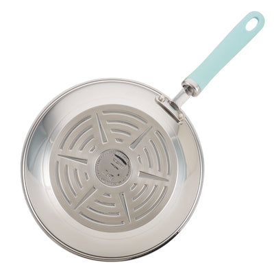 Steel frying pan with a light blue handle, viewed from above.