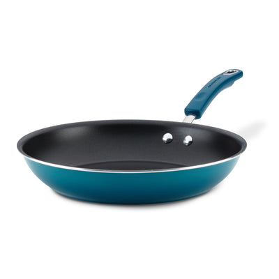 A blue non-stick frying pan with a handle, shown against a white background.