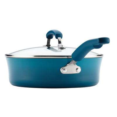 Blue saucepan with a glass lid and blue handles.