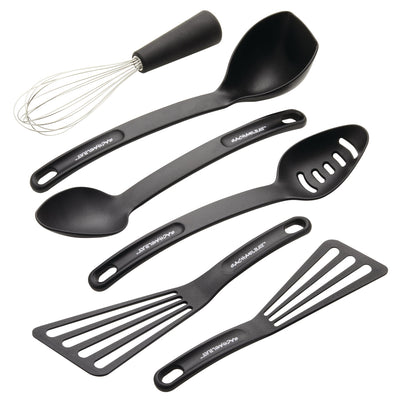 Black kitchen utensils on a white background, including a whisk and spatulas.