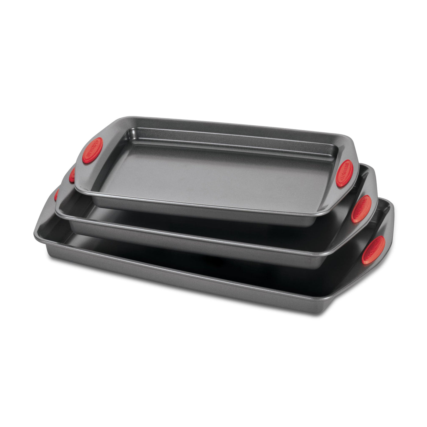 Three stacked rectangular baking trays with red silicone handles.