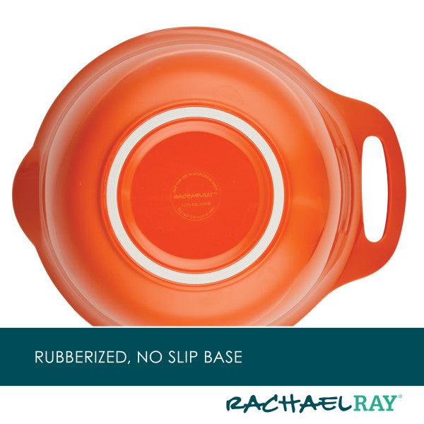 Orange bowl with rubberized, no-slip base and a handle on one side.