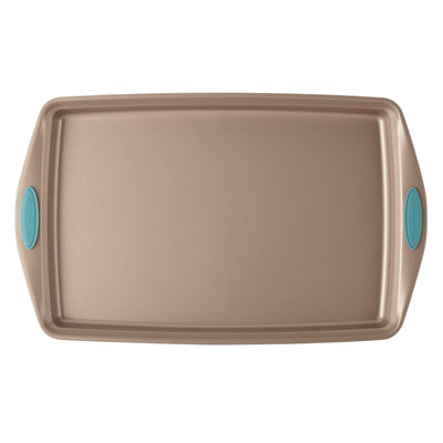 Rectangular baking sheet with teal handles on both sides.