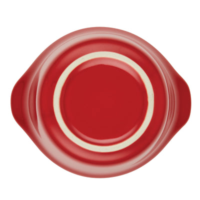 Red, round ceramic dish with a white circle on top view.