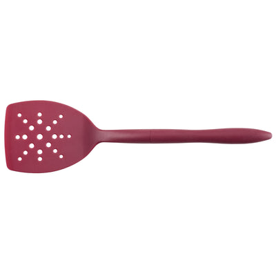 Red slotted spatula with a long handle on a white background.