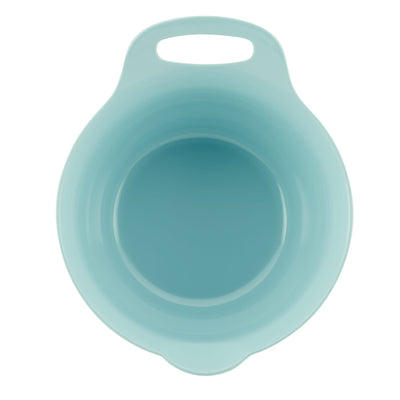 Aqua-colored bowl with a handle viewed from above.