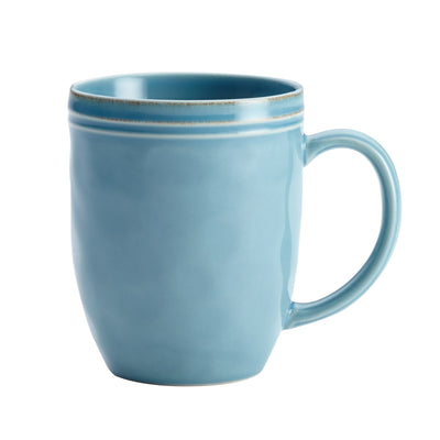 A light blue ceramic mug with a handle, viewed from the side.