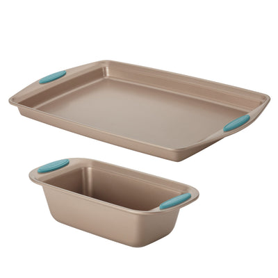 Two nonstick baking pans with teal handles, one rectangular, one loaf-shaped.