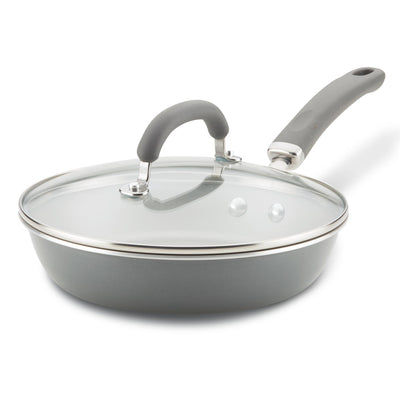 Gray skillet with a glass lid and a gray handle.