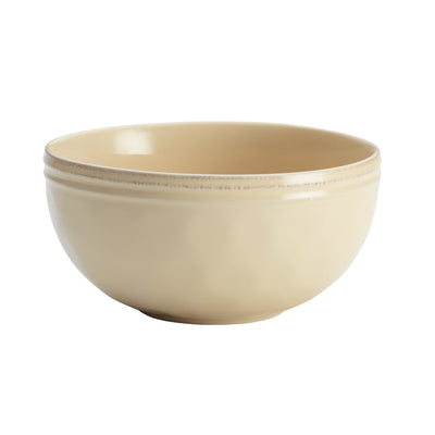 A beige ceramic bowl on a plain white background.