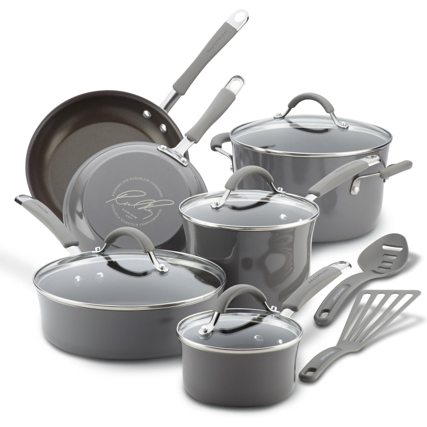Set of gray cookware with lids and kitchen utensils.