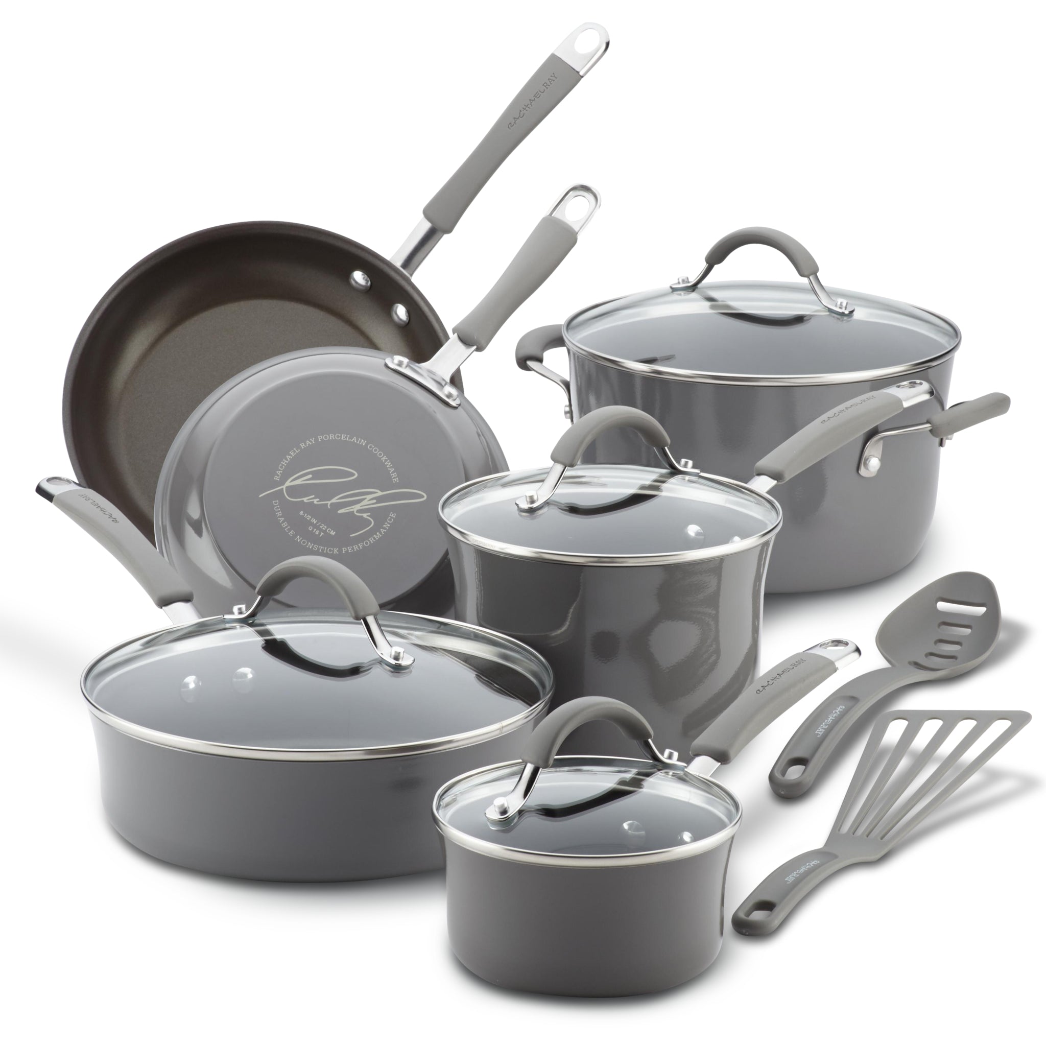 Set of gray cookware with lids and kitchen utensils.