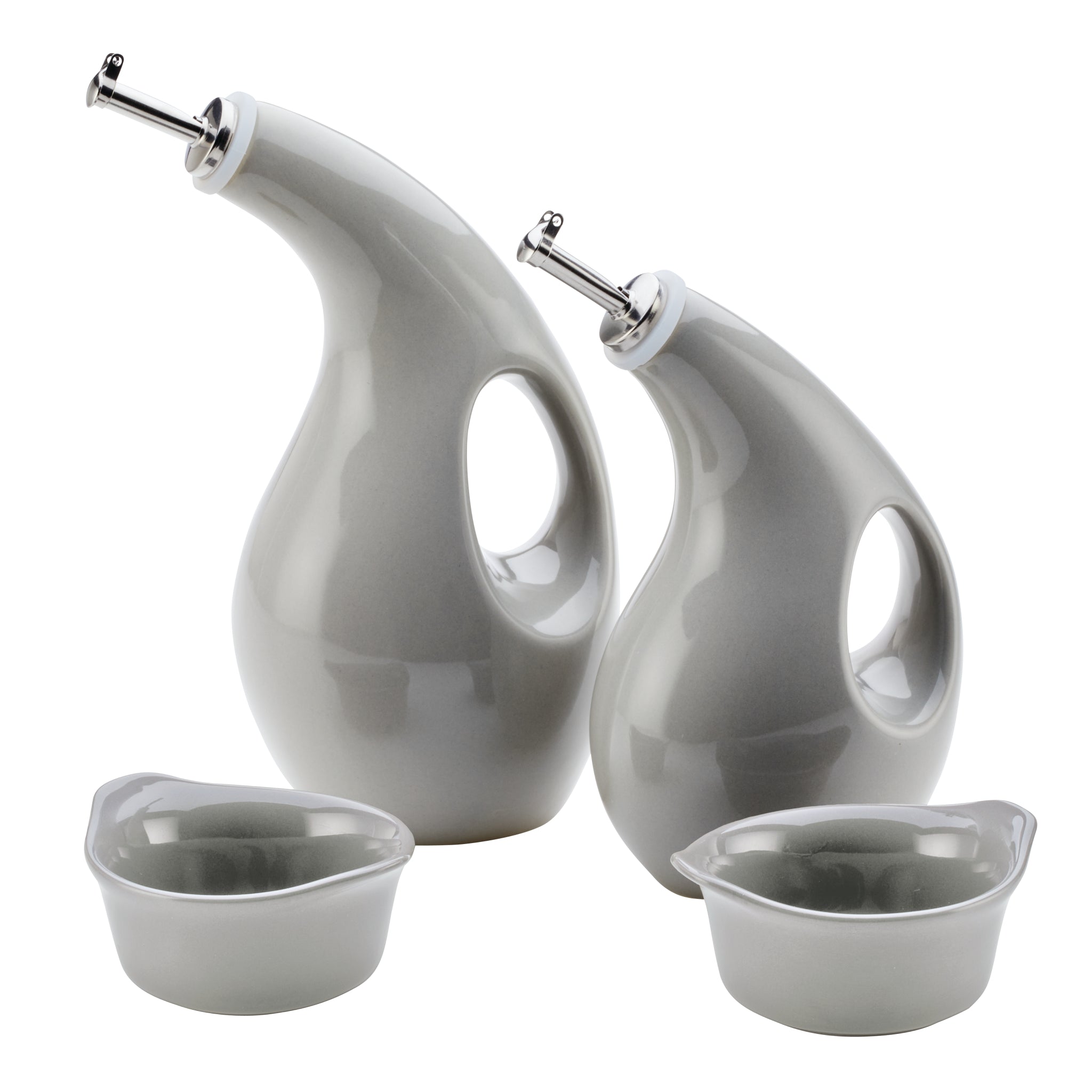 Curved oil dispensers and small bowls with a modern design.
