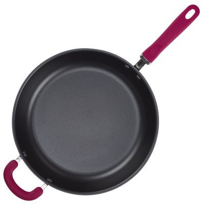 Non-stick frying pan with a red handle and helper handle.