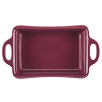 Rectangular maroon baking dish with handles on both sides.